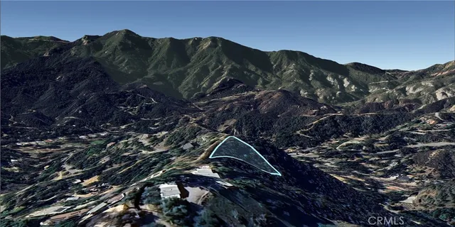 a view of houses with a street