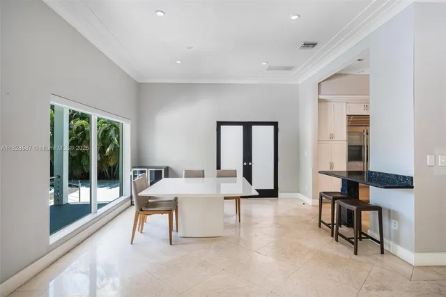 a kitchen with stainless steel appliances granite countertop a sink and a stove