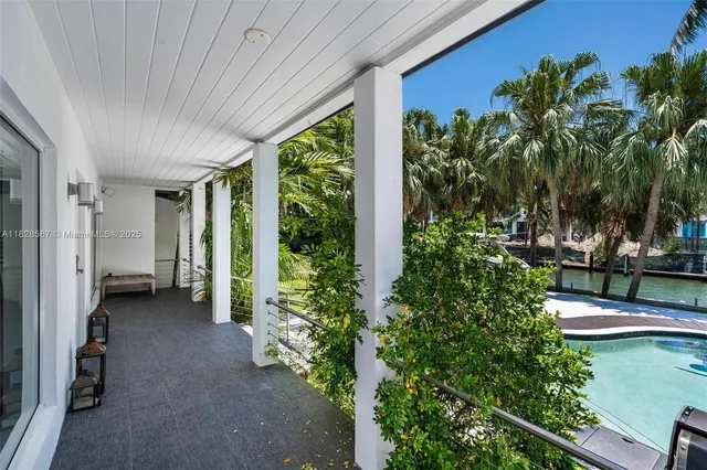 a view of outdoor space swimming pool and trees