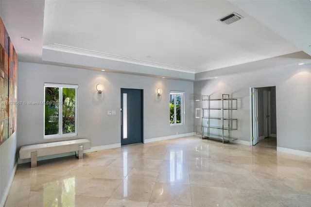 a view of a livingroom with furniture window and outside view