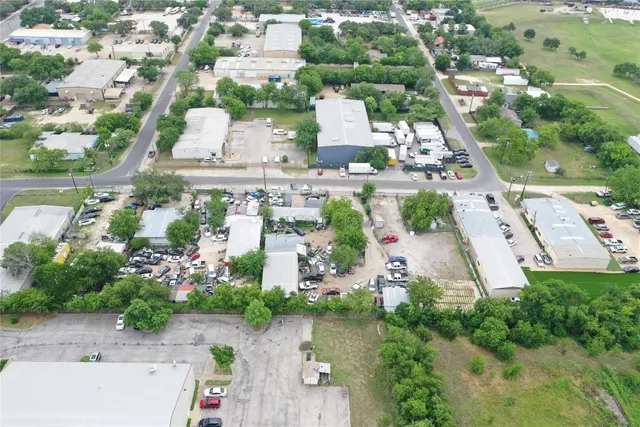 an aerial view of a city with lake view