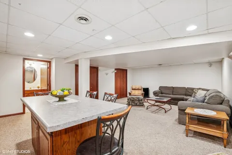 a living room with furniture and window