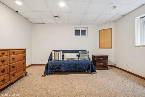 a bedroom with a bed and furniture