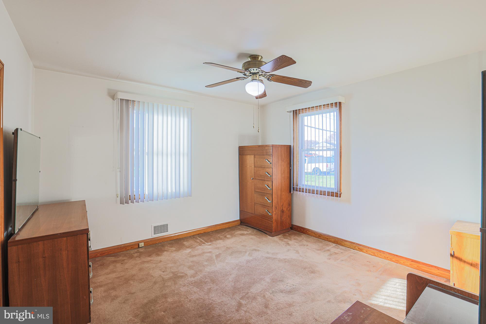 8506 Coco Road Baltimore, MD 21237 - Photo 22 of 39 a view of an empty room with a window
