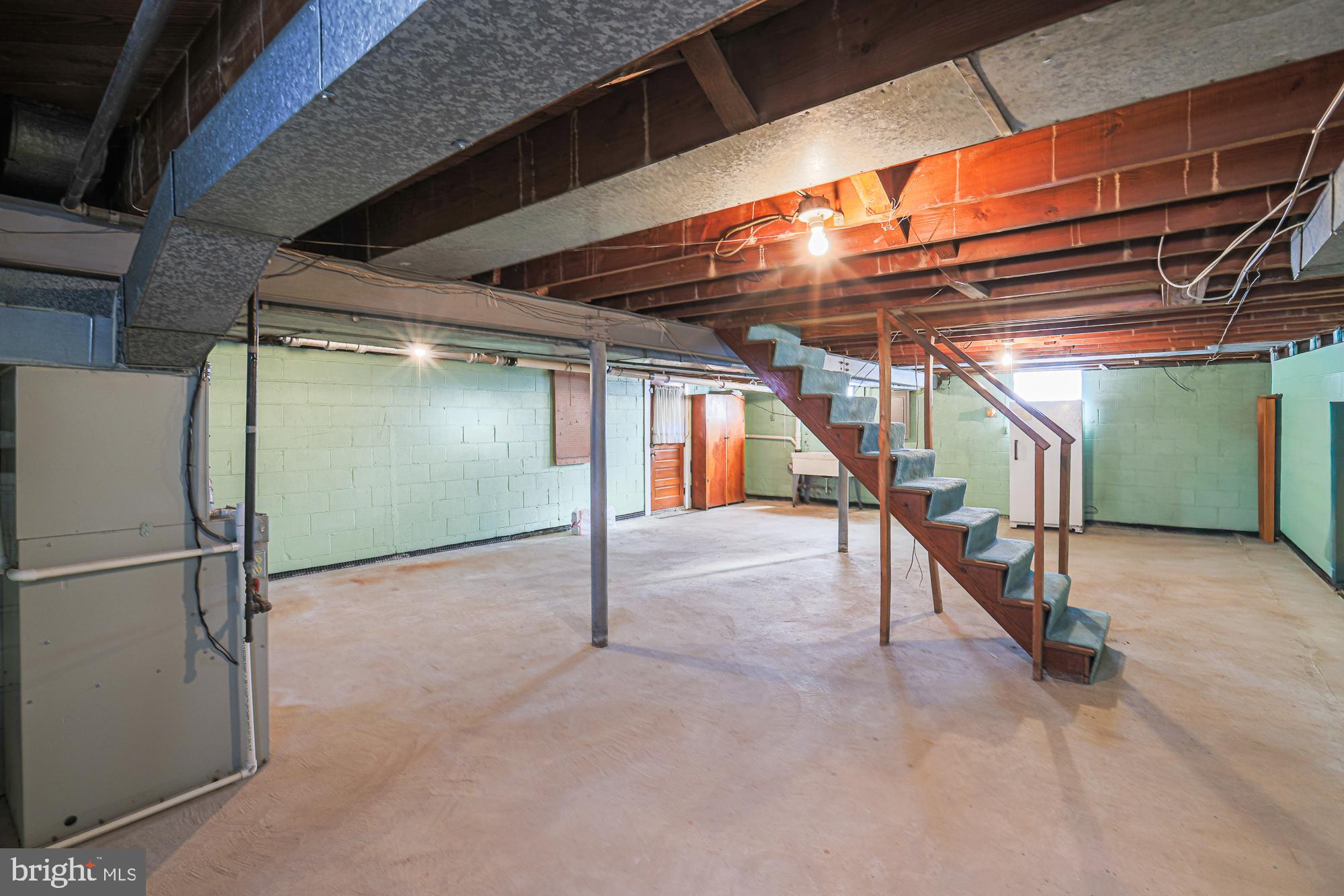 8506 Coco Road Baltimore, MD 21237 - Photo 31 of 39 a view of an empty room with wooden floor