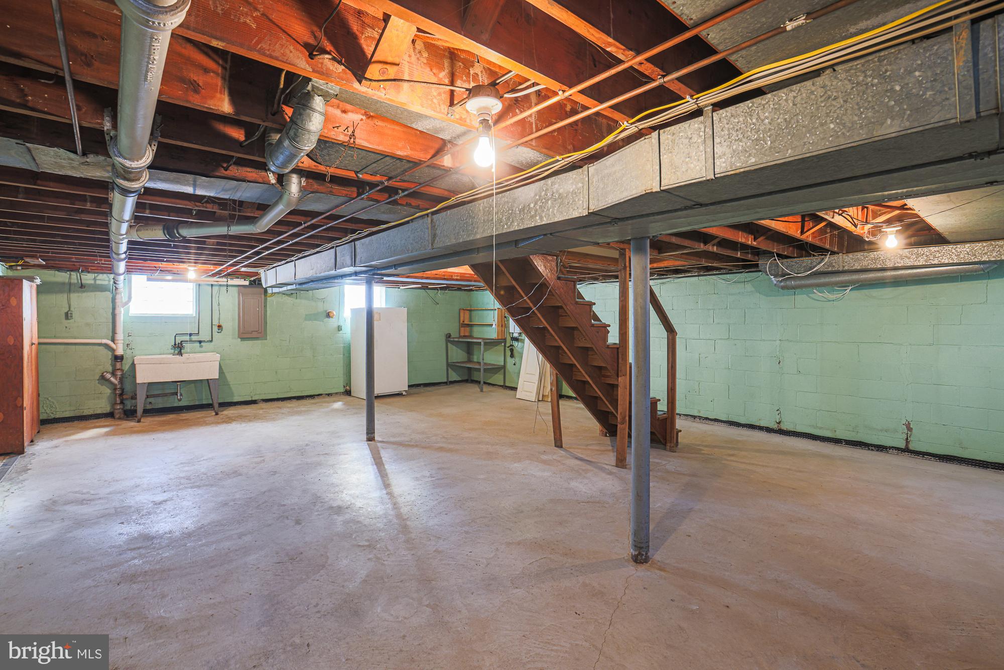 8506 Coco Road Baltimore, MD 21237 - Photo 33 of 39 a view of empty room with wooden ceiling