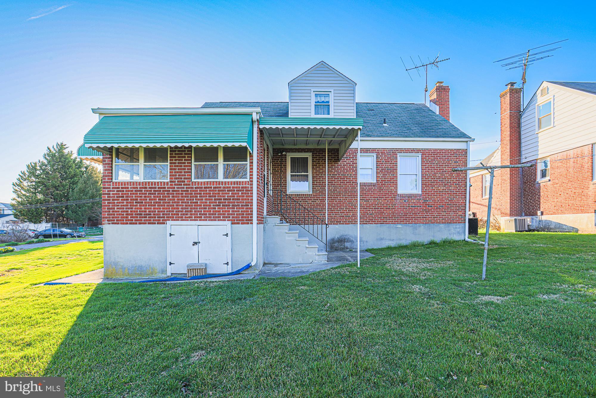 8506 Coco Road Baltimore, MD 21237 - Photo 34 of 39 a front view of a house with garden