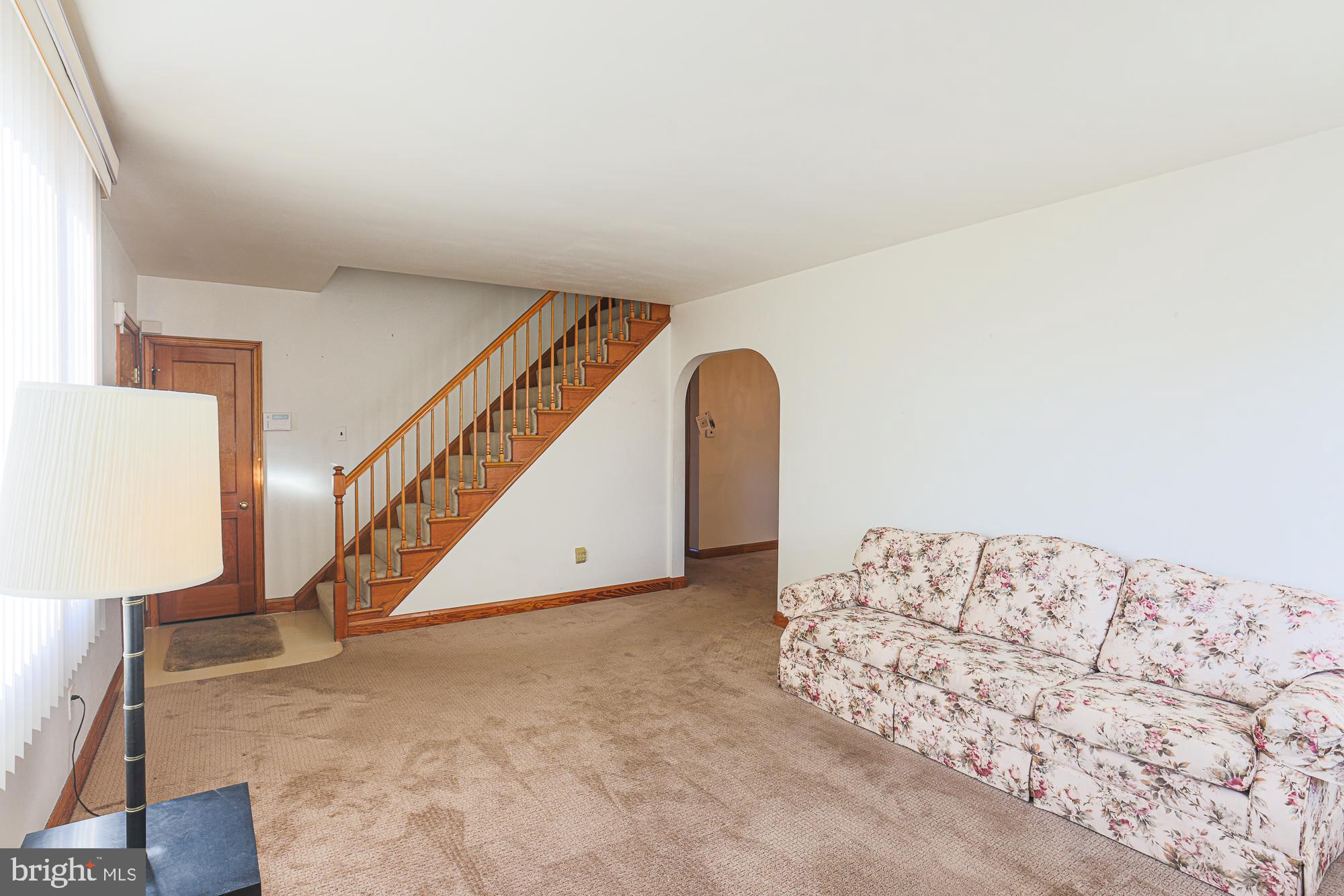 8506 Coco Road Baltimore, MD 21237 - Photo 8 of 39 a view of an empty room and wooden floor