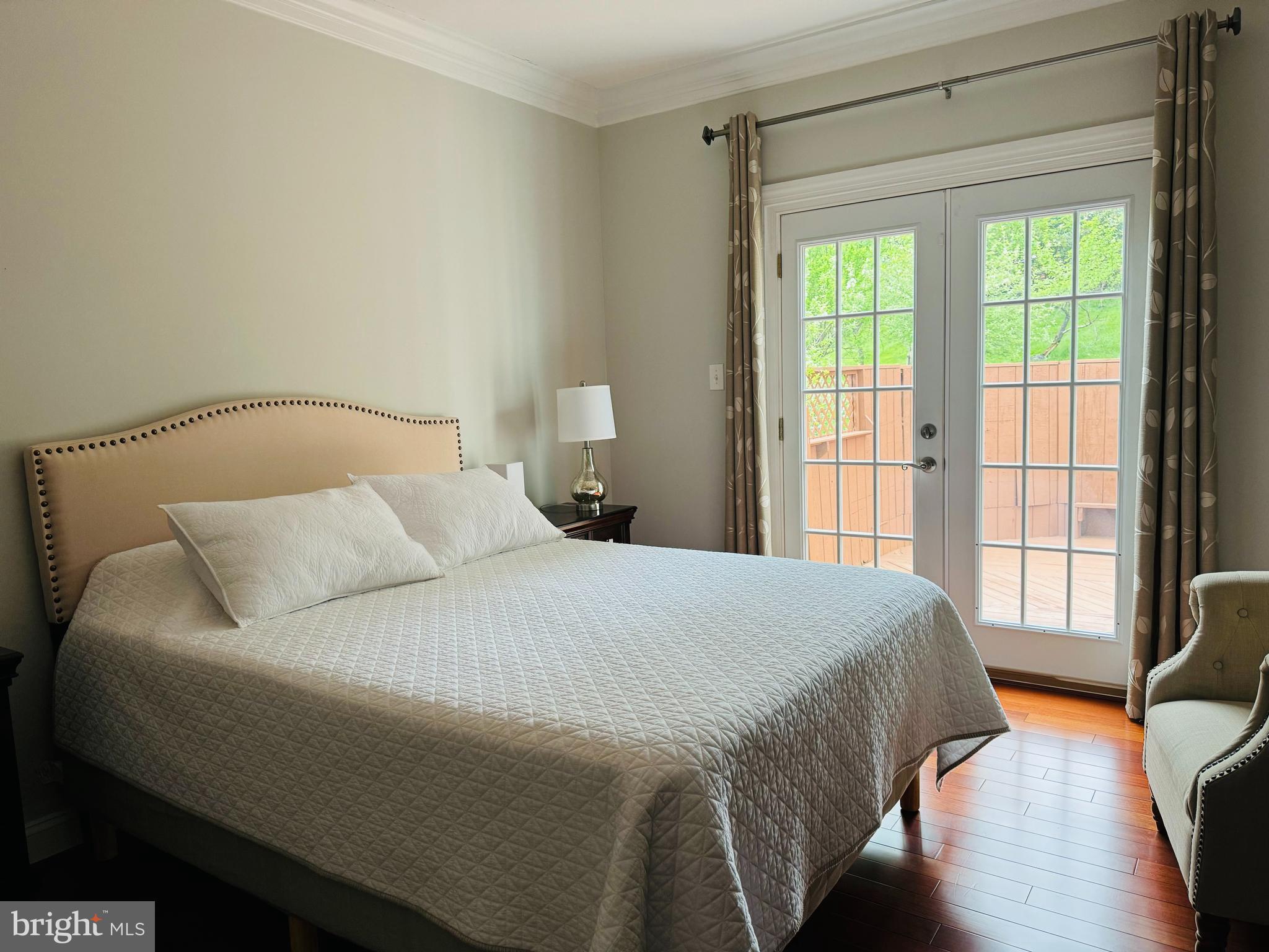 9706 Middleton Ridge Road Vienna, VA 22182 - Photo 11 of 17 a bedroom with a bed and a window