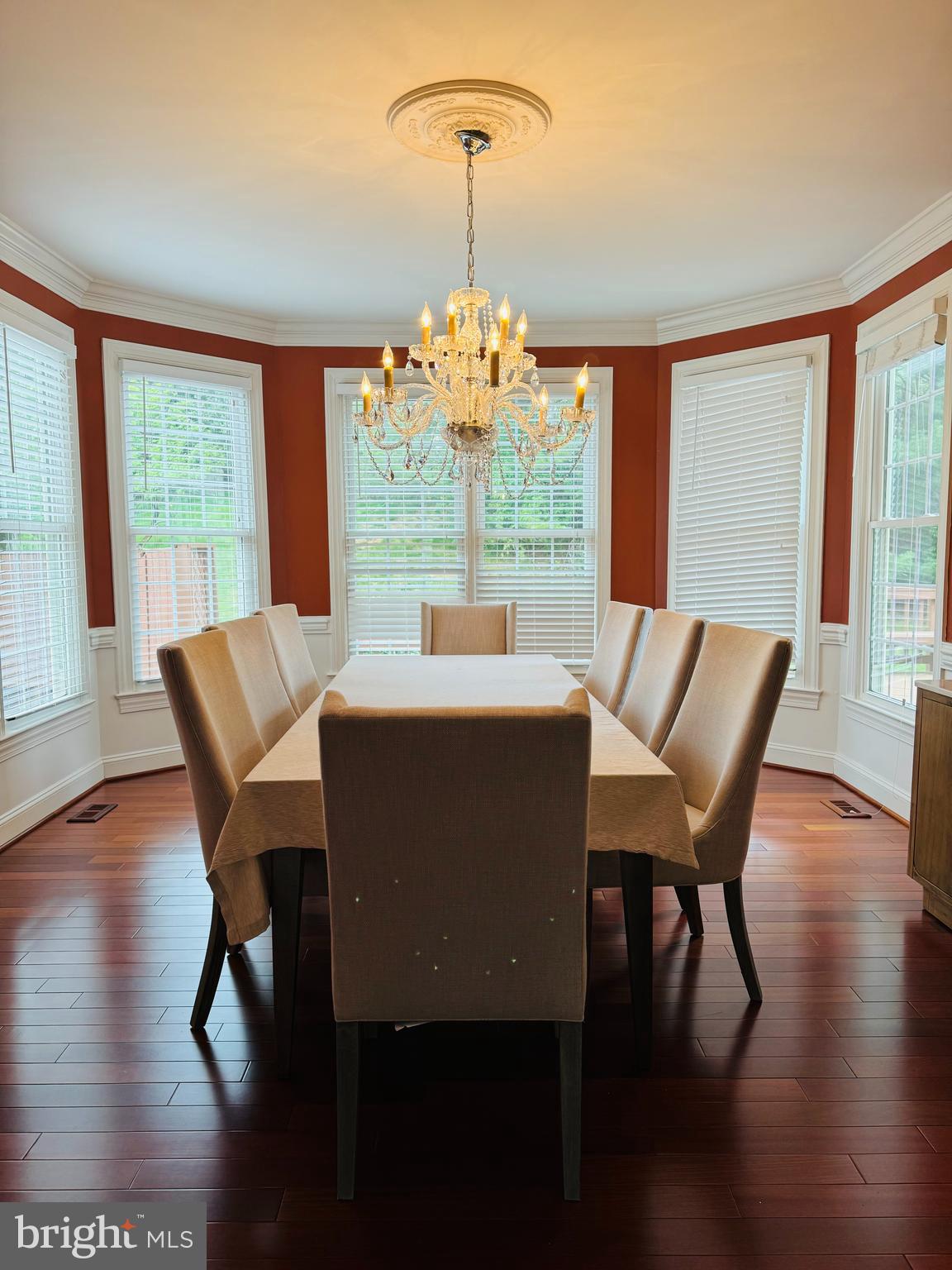9706 Middleton Ridge Road Vienna, VA 22182 - Photo 6 of 17 a dining room with furniture window and wooden floor