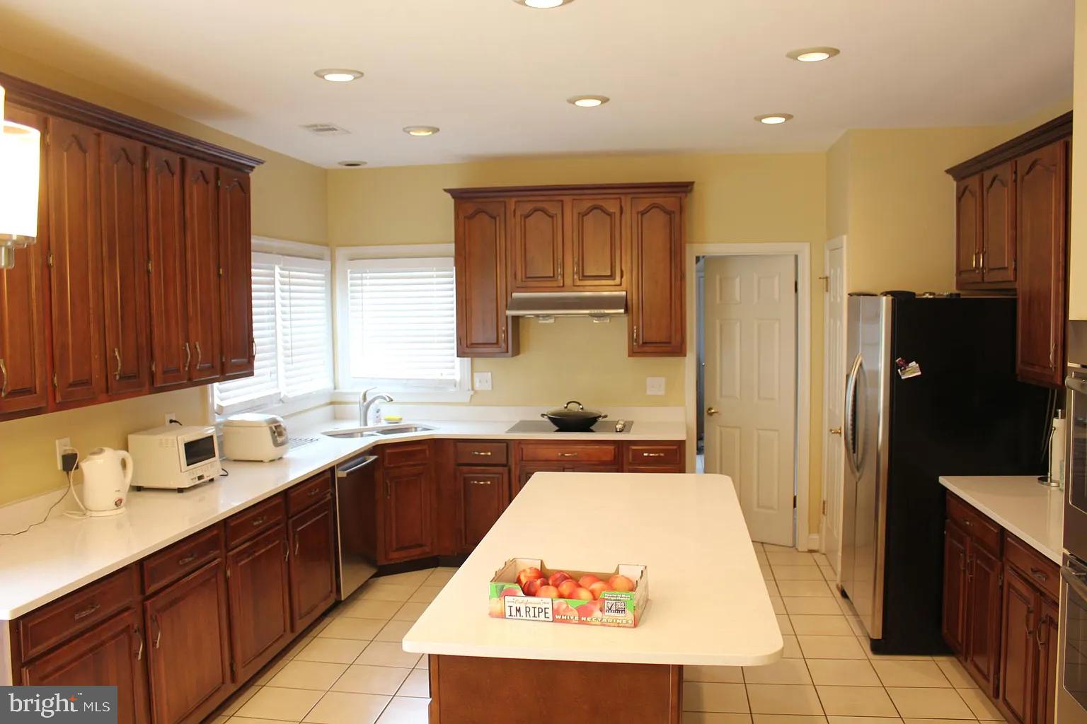 9706 Middleton Ridge Road Vienna, VA 22182 - Photo 9 of 17 a very nice looking kitchen with a large window