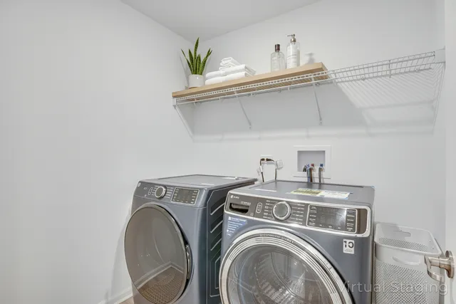 a utility room with dryer and washer