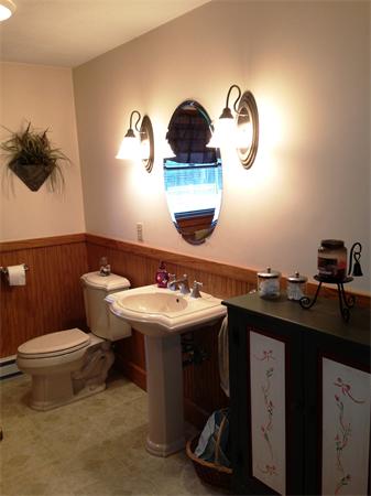 222 Hunt Road Oakham, MA 01068 - Photo 24 of 30 a bathroom with a sink and a toilet