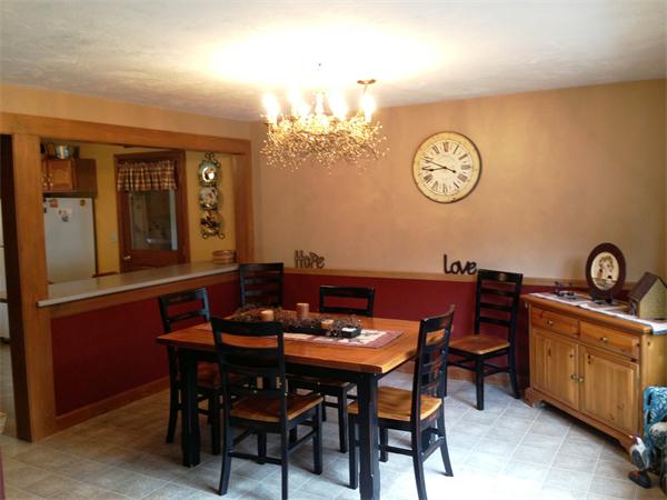 222 Hunt Road Oakham, MA 01068 - Photo 3 of 30 a view of a dining room and a table and chairs