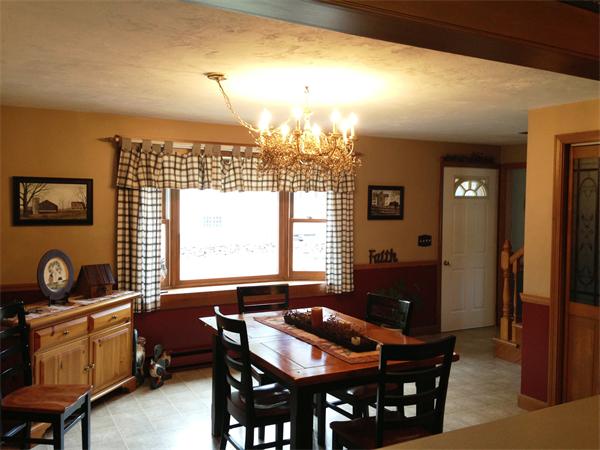 222 Hunt Road Oakham, MA 01068 - Photo 6 of 30 a view of a dining room with furniture and a window