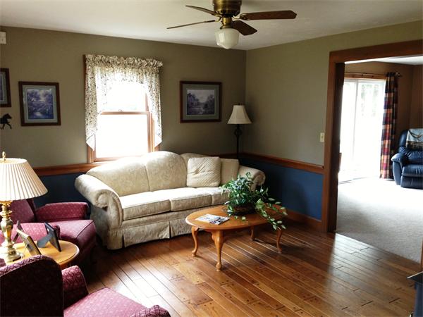 222 Hunt Road Oakham, MA 01068 - Photo 8 of 30 a living room with furniture and a window