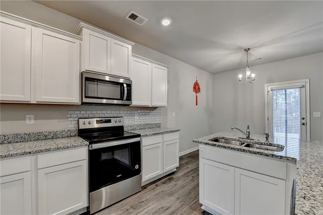 $395,000 | 1308 Brookstone Lake Drive, Conyers, GA 30012