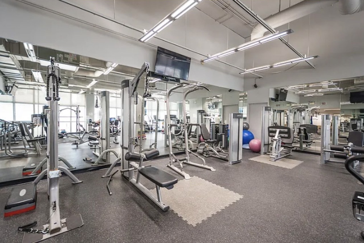 655 West Irving Park Road, Unit 3706 Chicago, IL 60613 - Photo 16 of 16 a view of a room with gym equipment