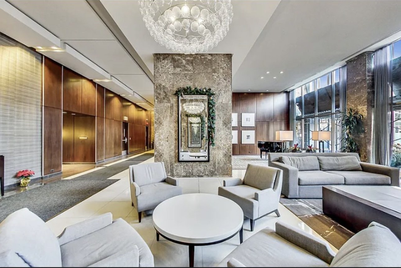 655 West Irving Park Road, Unit 3706 Chicago, IL 60613 - Photo 2 of 16 a living room with furniture and a large window