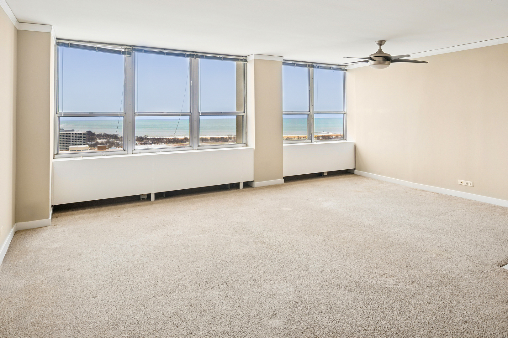 655 West Irving Park Road, Unit 3706 Chicago, IL 60613 - Photo 4 of 16 an empty room with a window