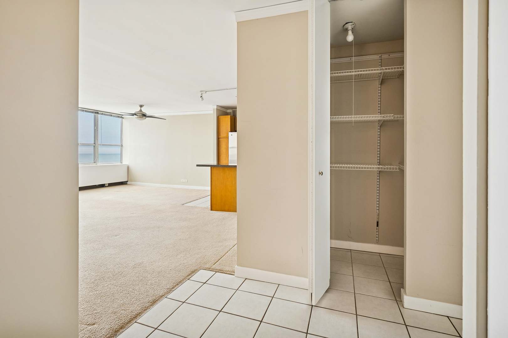 655 West Irving Park Road, Unit 3706 Chicago, IL 60613 - Photo 10 of 16 a view of an empty room and bathroom