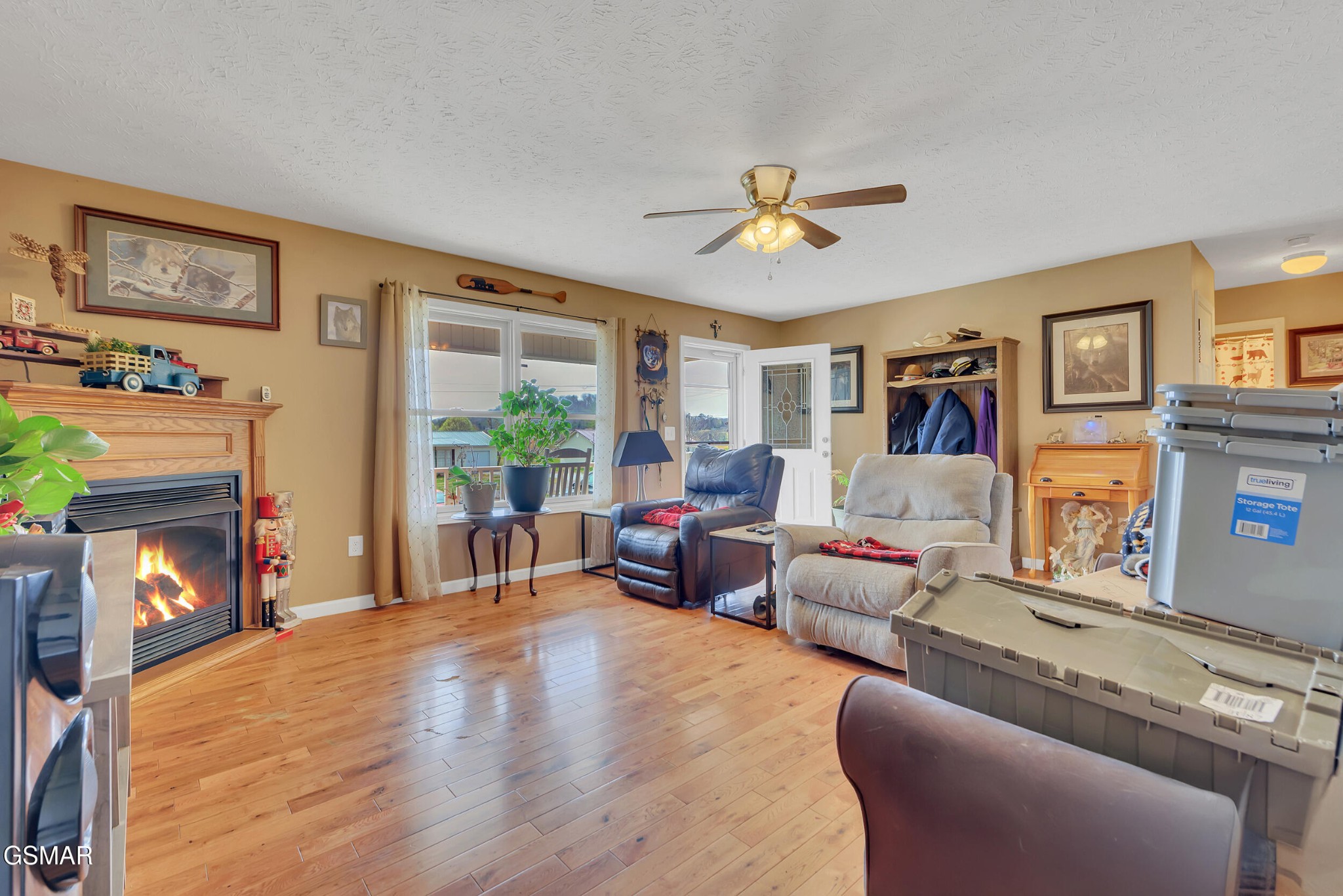 274 Ramblin Road Newport, TN 37821 - Photo 10 of 32 a living room with furniture and a fireplace