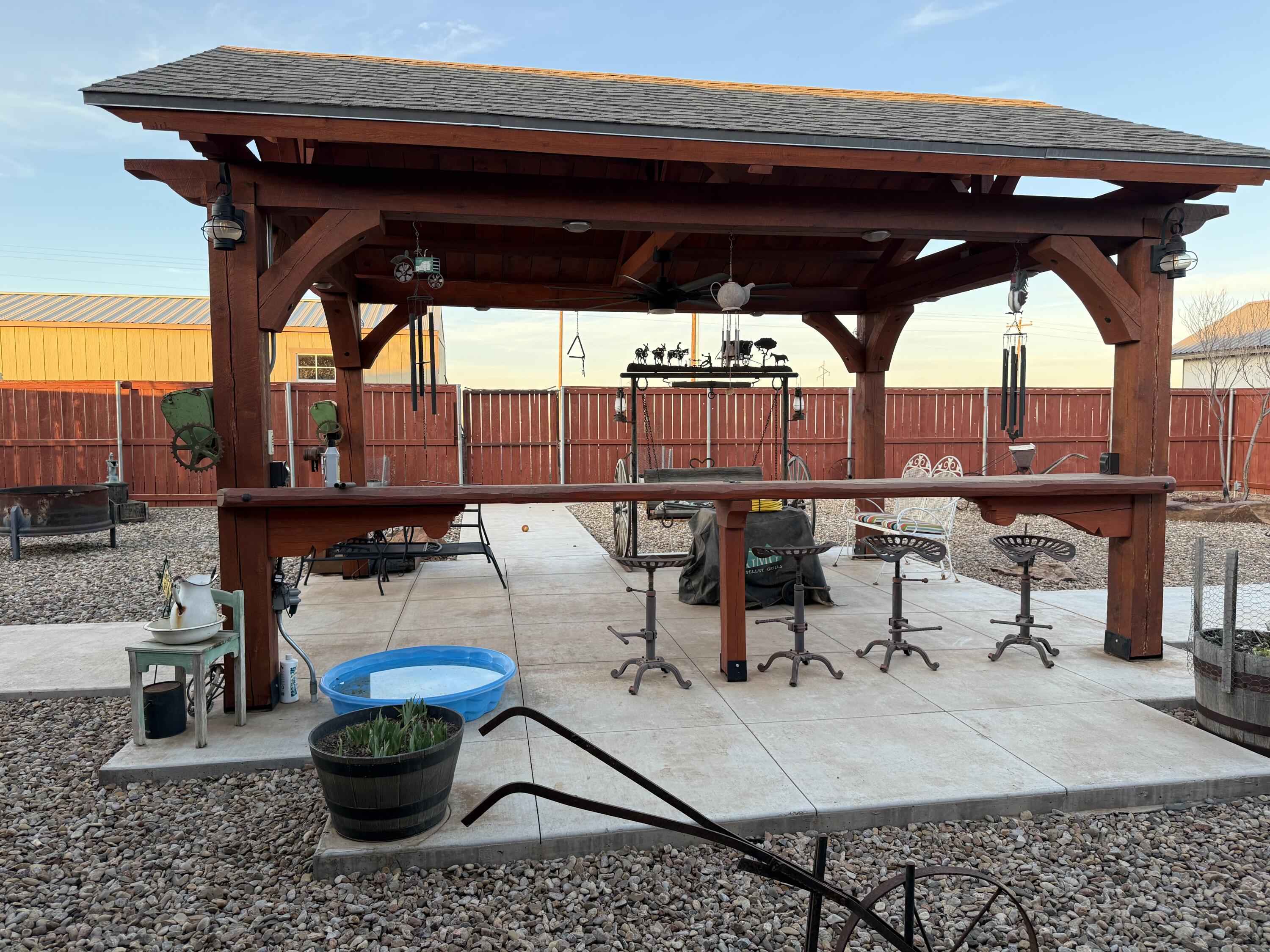 19 Ridgeview Farwell, TX 79325 - Photo 32 of 40 a view of a patio with table and chairs potted plants