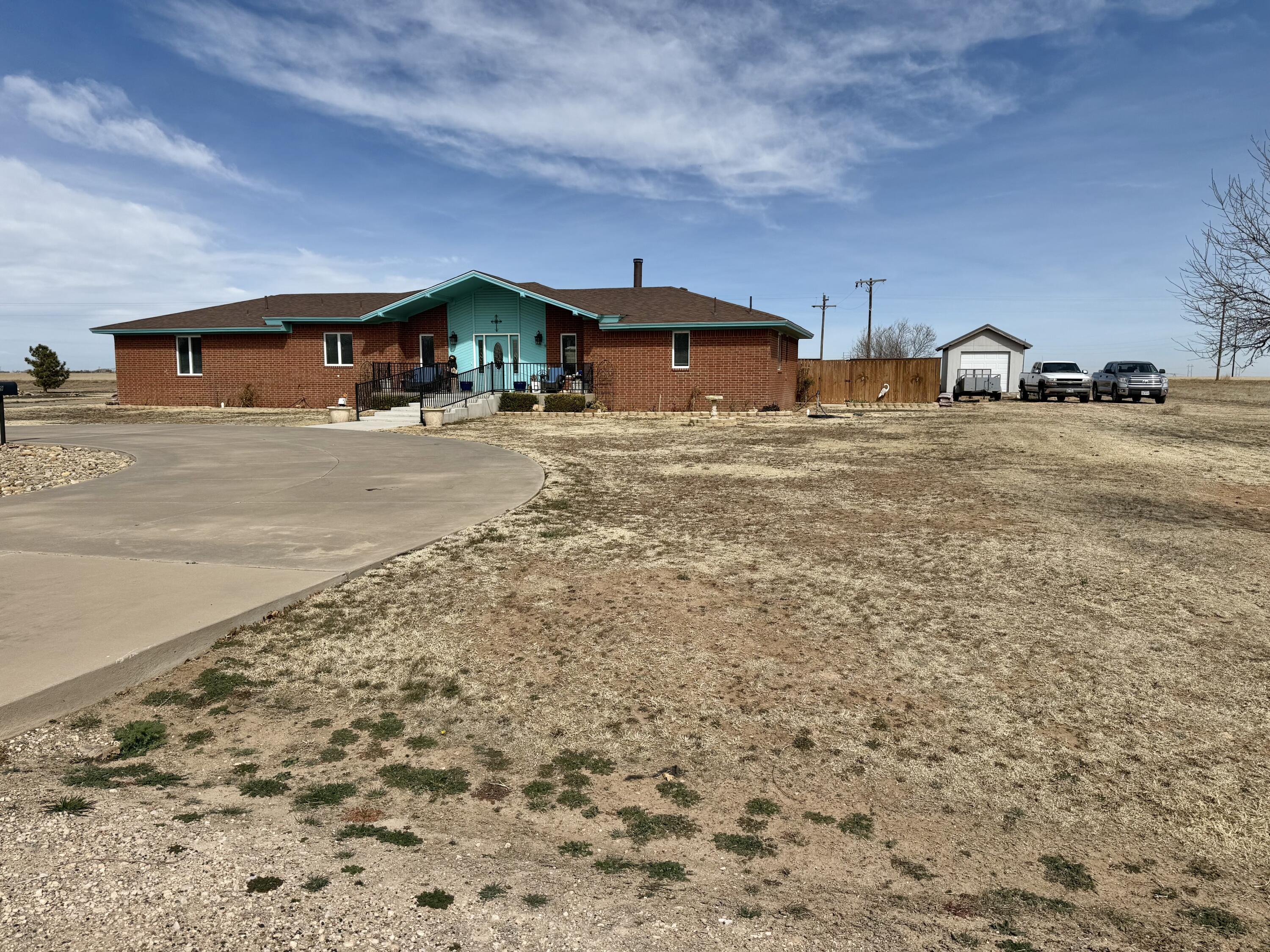 19 Ridgeview Farwell, TX 79325 - Photo 5 of 40 a front view of a house with a yard