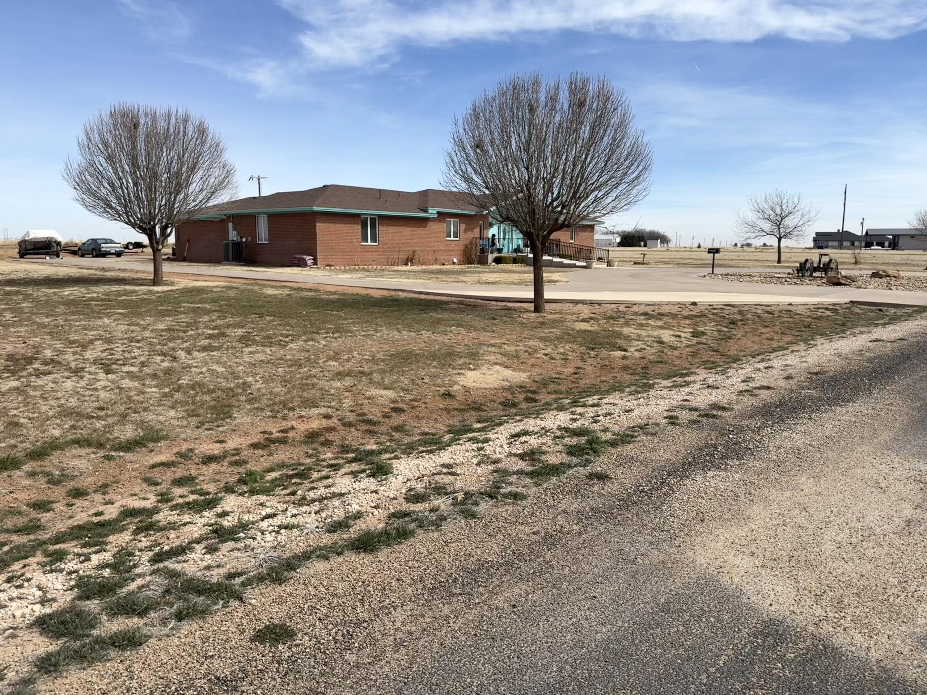 19 Ridgeview Farwell, TX 79325 - Photo 6 of 40 a view of a house with a yard