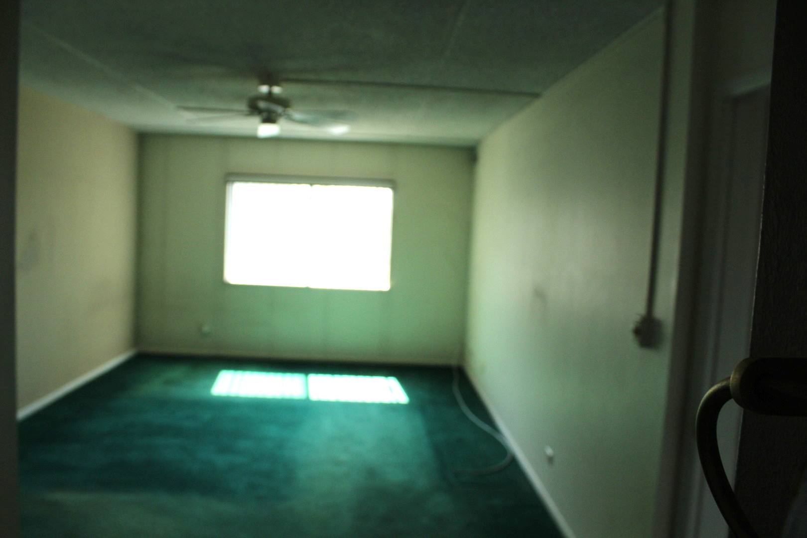 920 Vose Drive, Unit 402 Gurnee, IL 60031 - Photo 29 of 42 a view of an empty room with a window