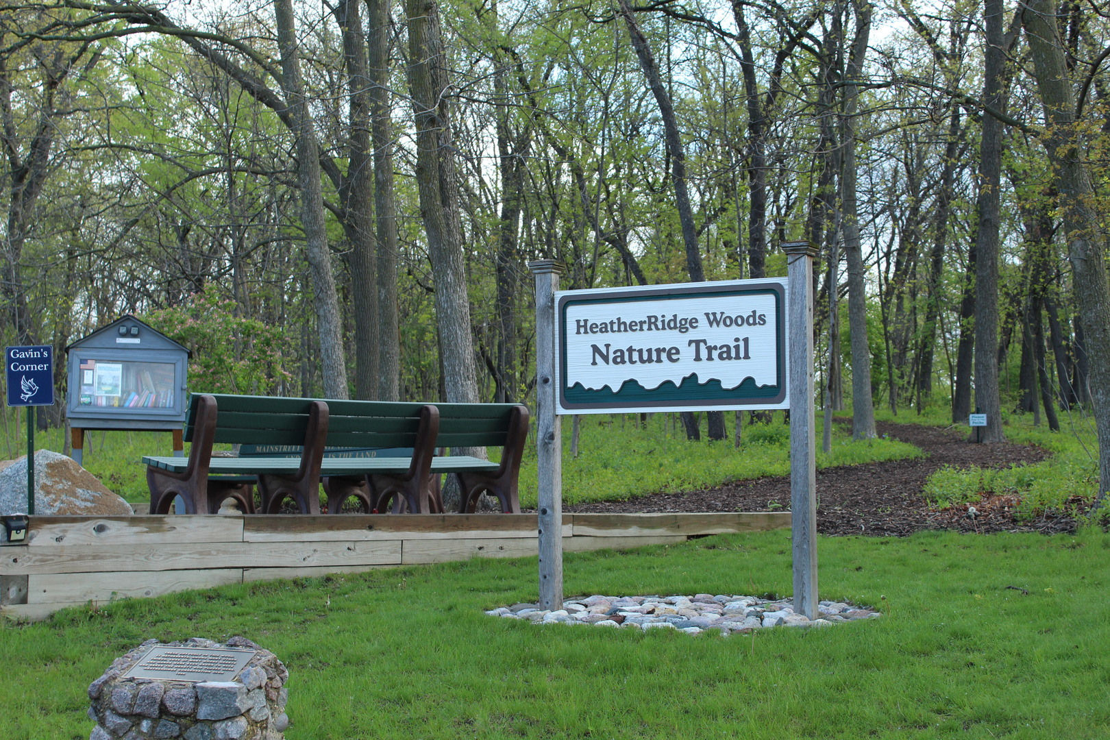 920 Vose Drive, Unit 402 Gurnee, IL 60031 - Photo 7 of 42 a view of a park that has a sign board large trees