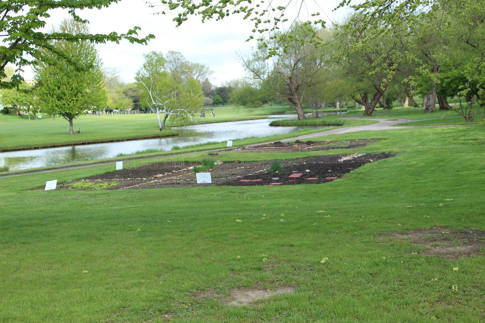 920 Vose Drive, Unit 402 Gurnee, IL 60031 - Photo 8 of 42 a view of a park and trees in the background