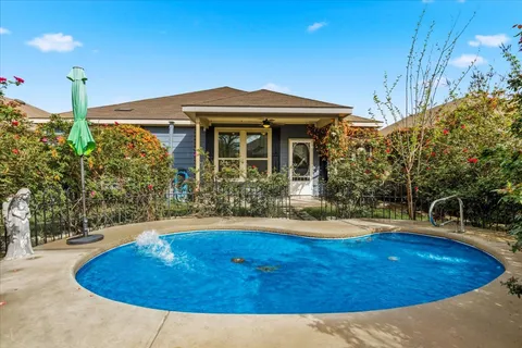 a view of outdoor space yard and swimming pool