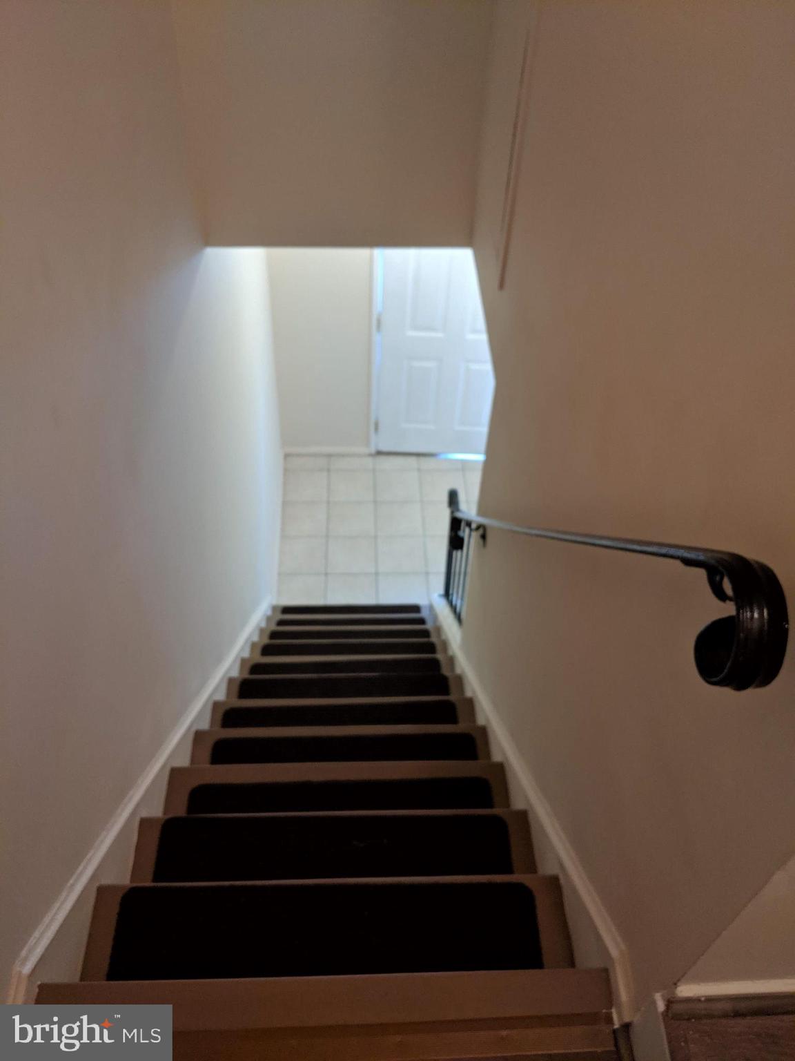 7760 Matisse Way Springfield, VA 22153 - Photo 12 of 21 Looking down to front door from upper lvl