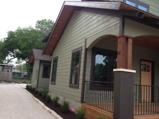 a front view of a house with a porch