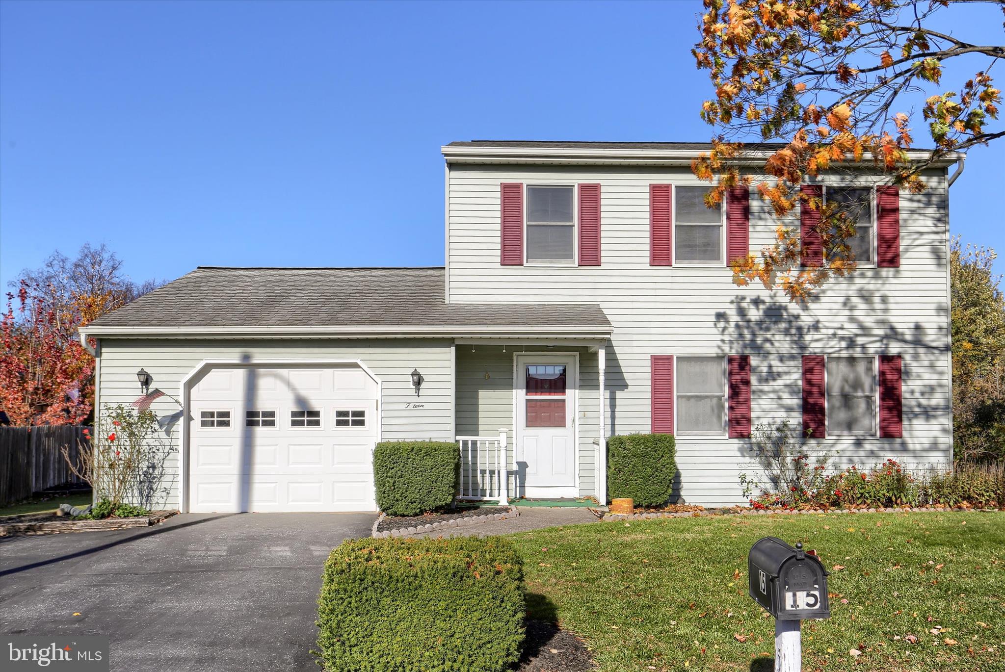 15 Patton Road Mechanicsburg, PA 17055 - Photo 1 of 36 a front view of a house with a yard and garage