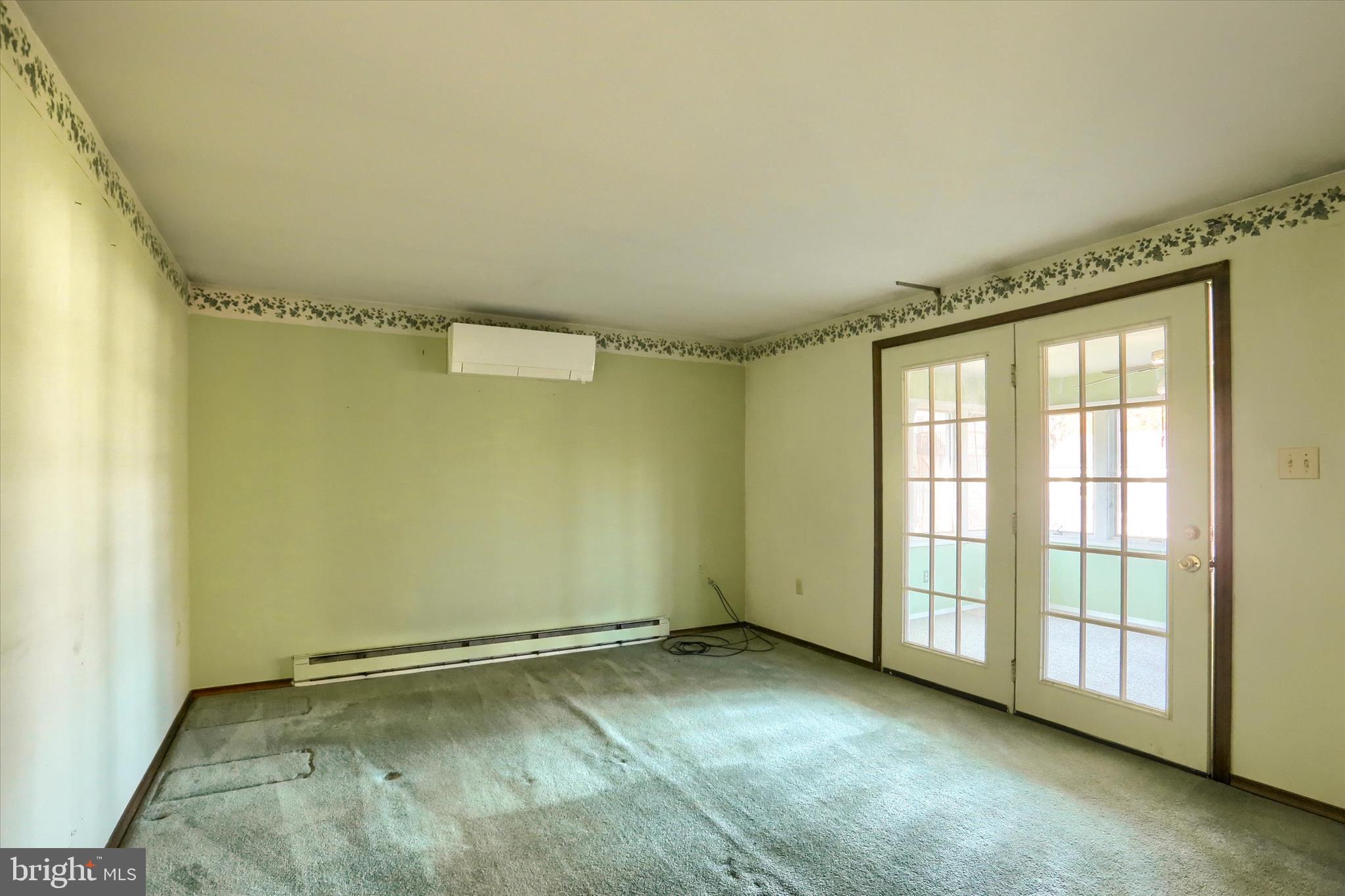15 Patton Road Mechanicsburg, PA 17055 - Photo 11 of 36 an empty room with a empty space and windows