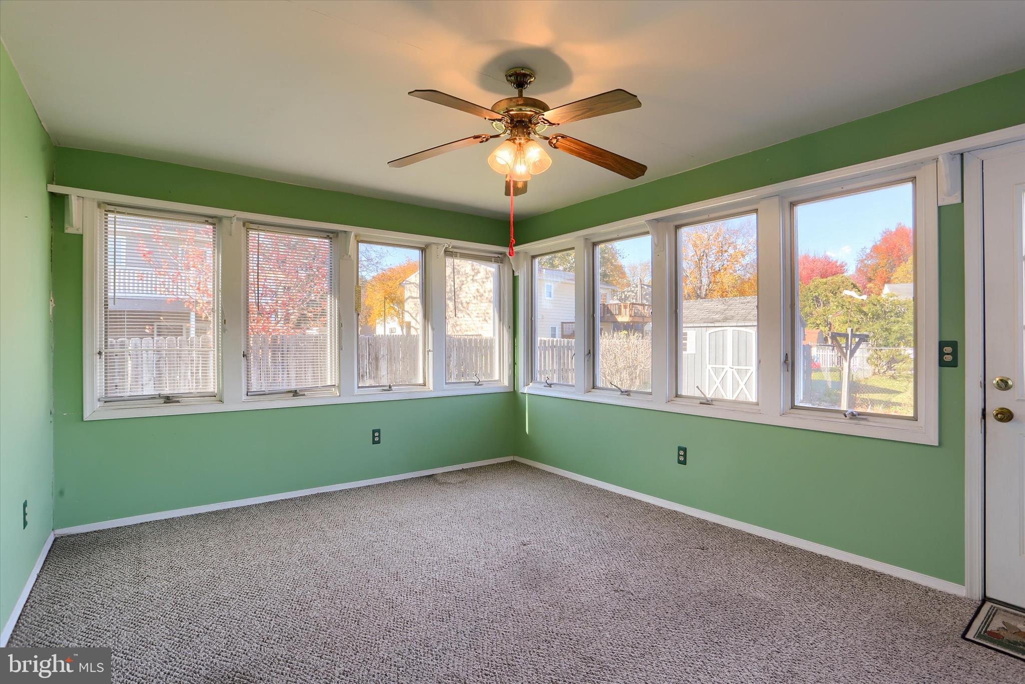 15 Patton Road Mechanicsburg, PA 17055 - Photo 14 of 36 a living room with a window and ceiling fan