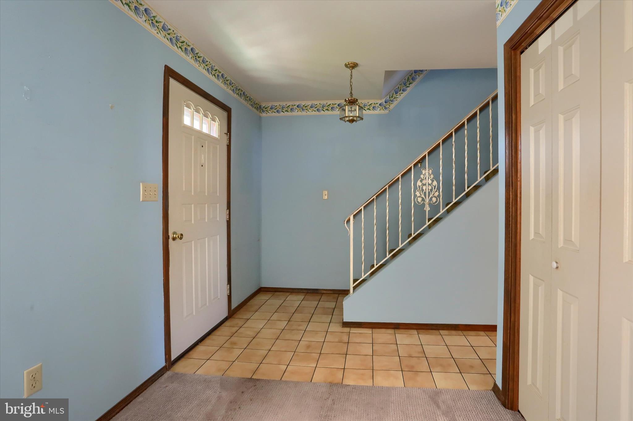 15 Patton Road Mechanicsburg, PA 17055 - Photo 17 of 36 a view of a hallway with a door and stairs