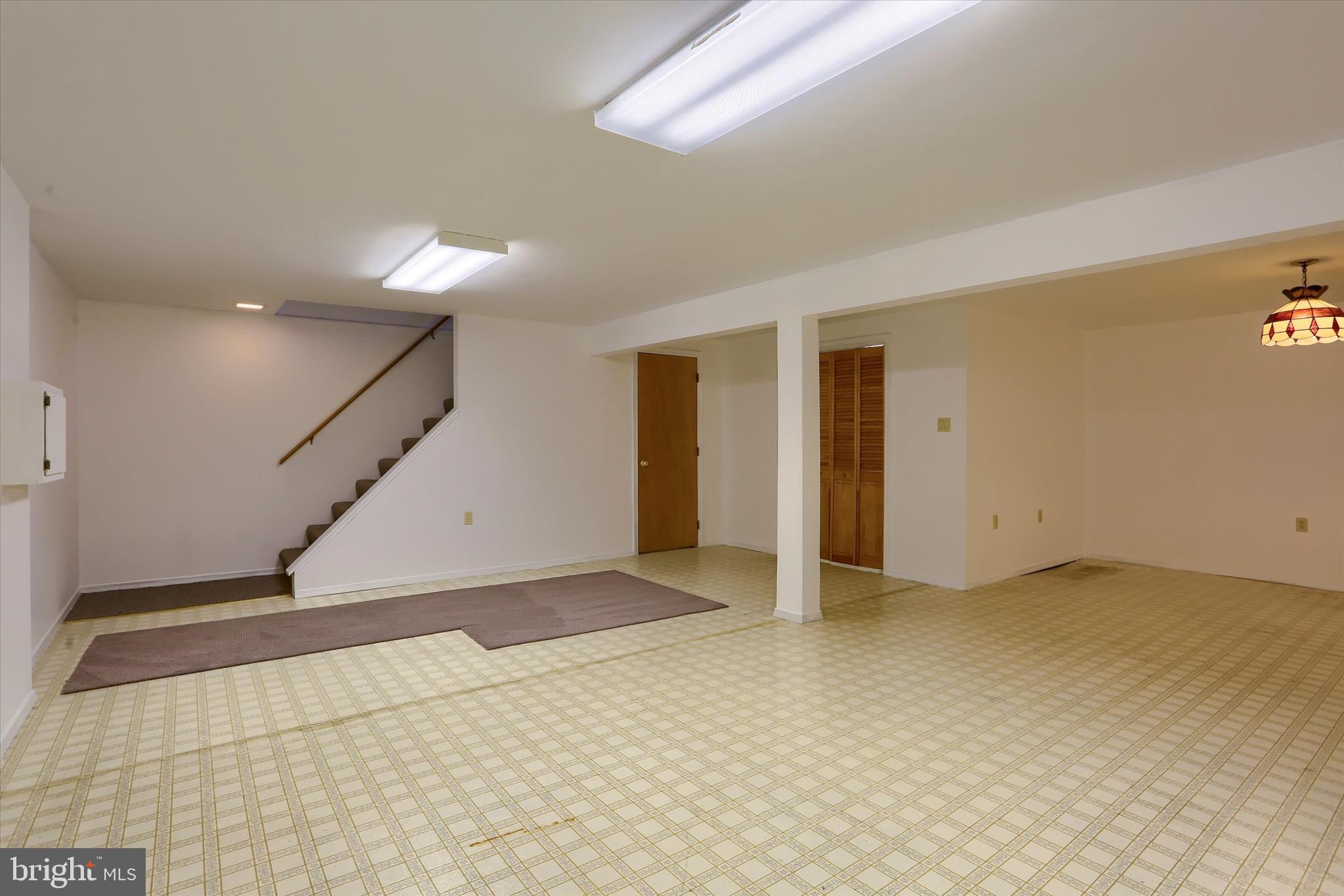 15 Patton Road Mechanicsburg, PA 17055 - Photo 26 of 36 a view of an empty room with stairs