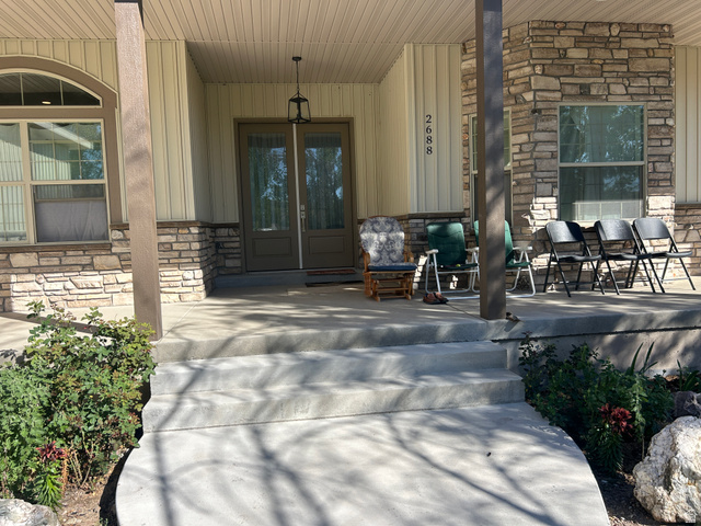 2688 Read Lane Preston, ID 83263 - Photo 3 of 18 Inviting front porch featuring stone and vertical siding accents