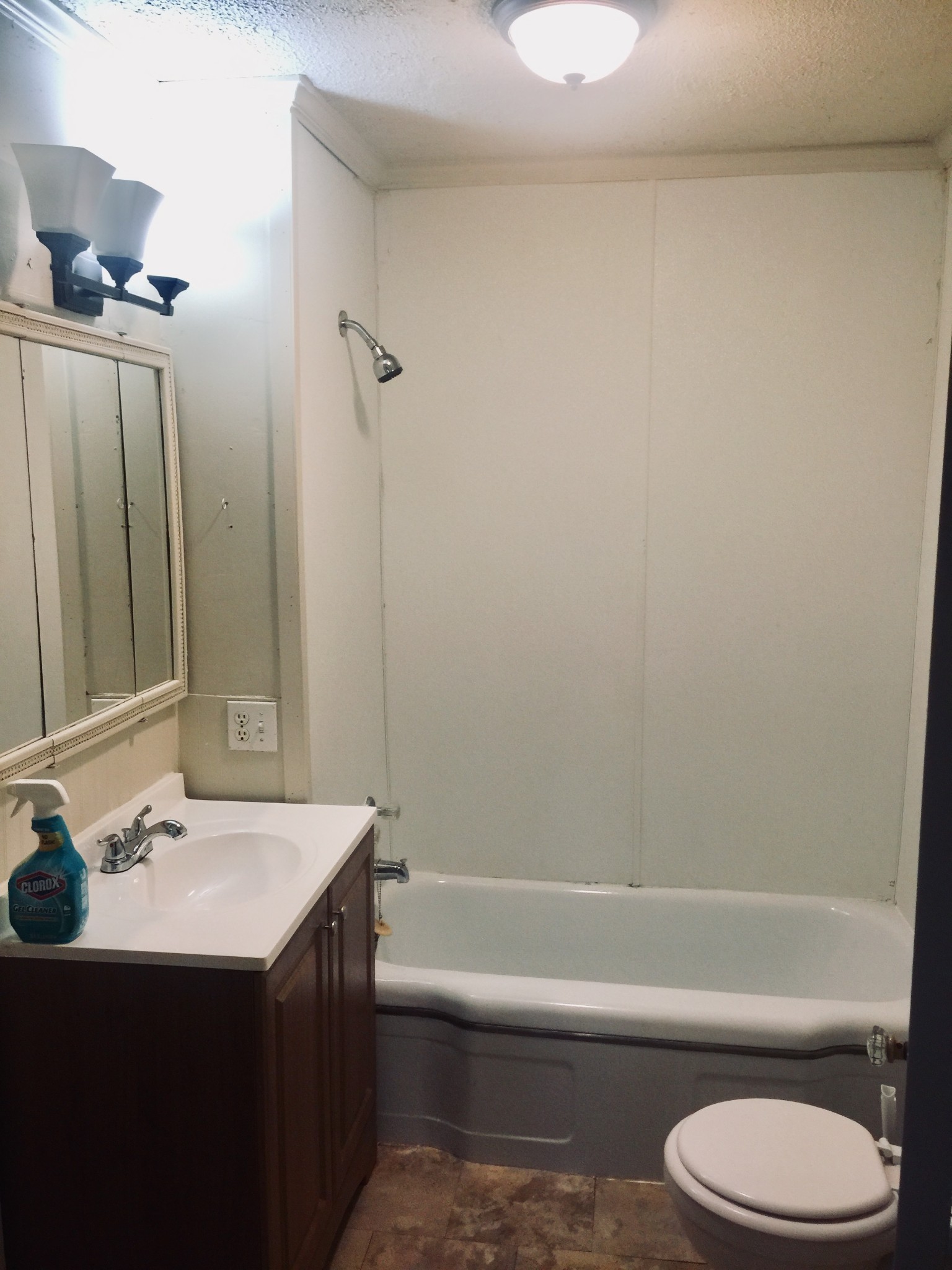 451 East Madison Street Pulaski, TN 38478 - Photo 7 of 16 a bathroom with a sink toilet and shower