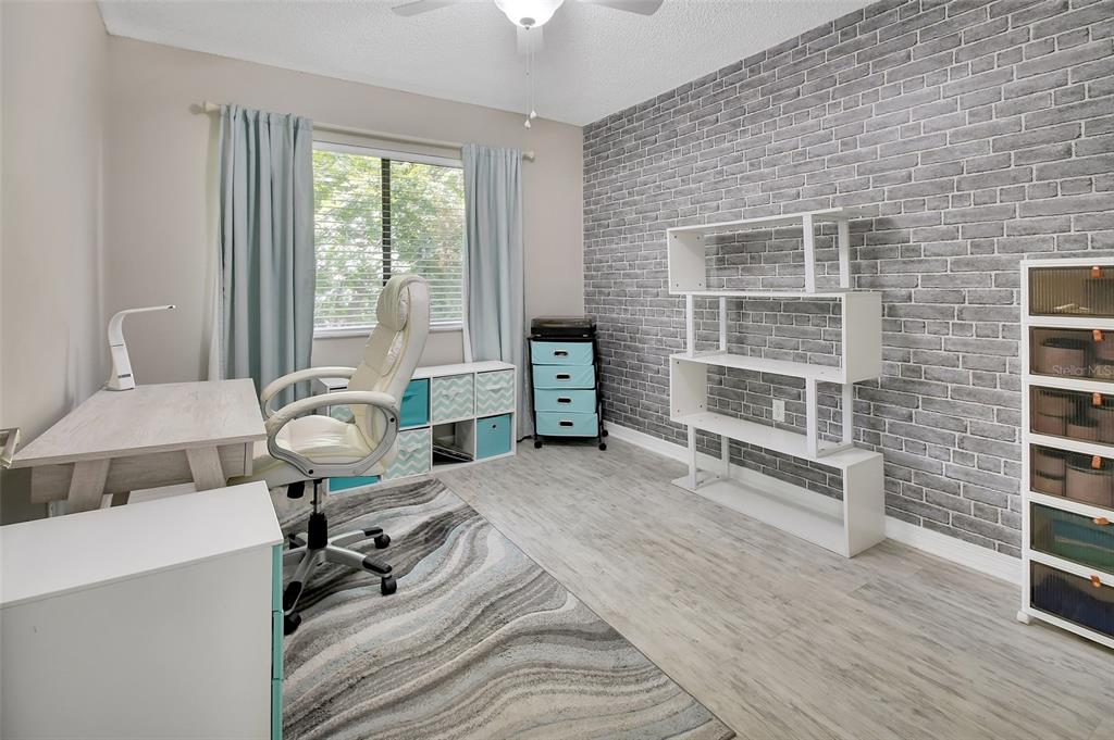 1601 Big Tree Road, Unit 307 South Daytona, FL 32119 - Photo 14 of 18 a view of a livingroom with furniture and a window