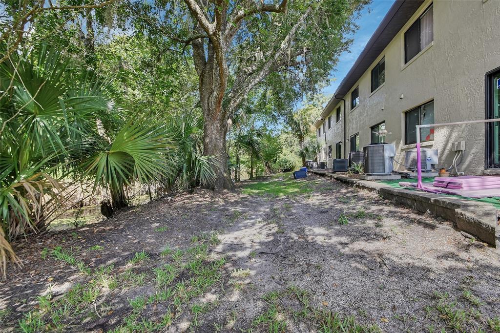 1601 Big Tree Road, Unit 307 South Daytona, FL 32119 - Photo 16 of 18 a view of outdoor space and yard