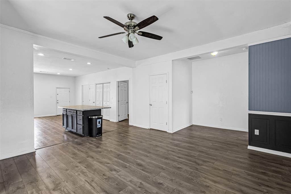 100 West Munson Street Denison, TX 75021 - Photo 3 of 12 a view of kitchen with table and chairs