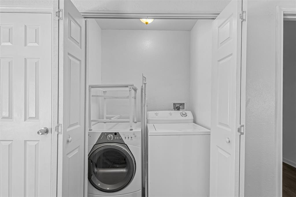 100 West Munson Street Denison, TX 75021 - Photo 6 of 12 a utility room with dryer and washer