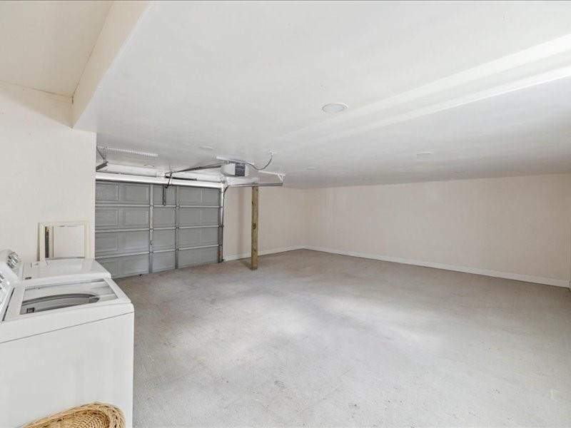 1801 Hussion Street Houston, TX 77003 - Photo 17 of 20 a view of storage and utility room with washer and dryer