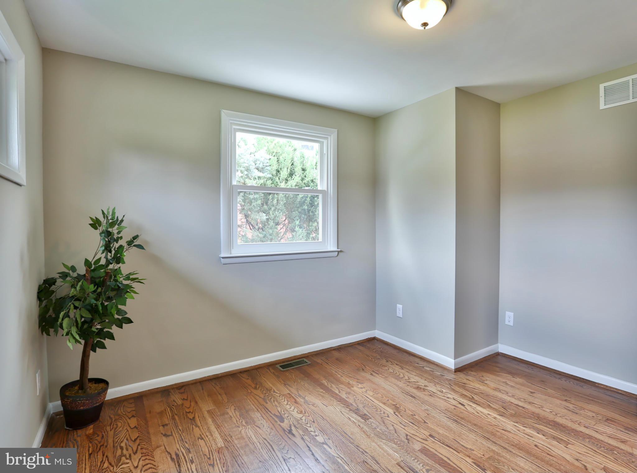391 Butler Road Reisterstown, MD 21136 - Photo 17 of 30 Spacious Bedroom With Hardwood Floors