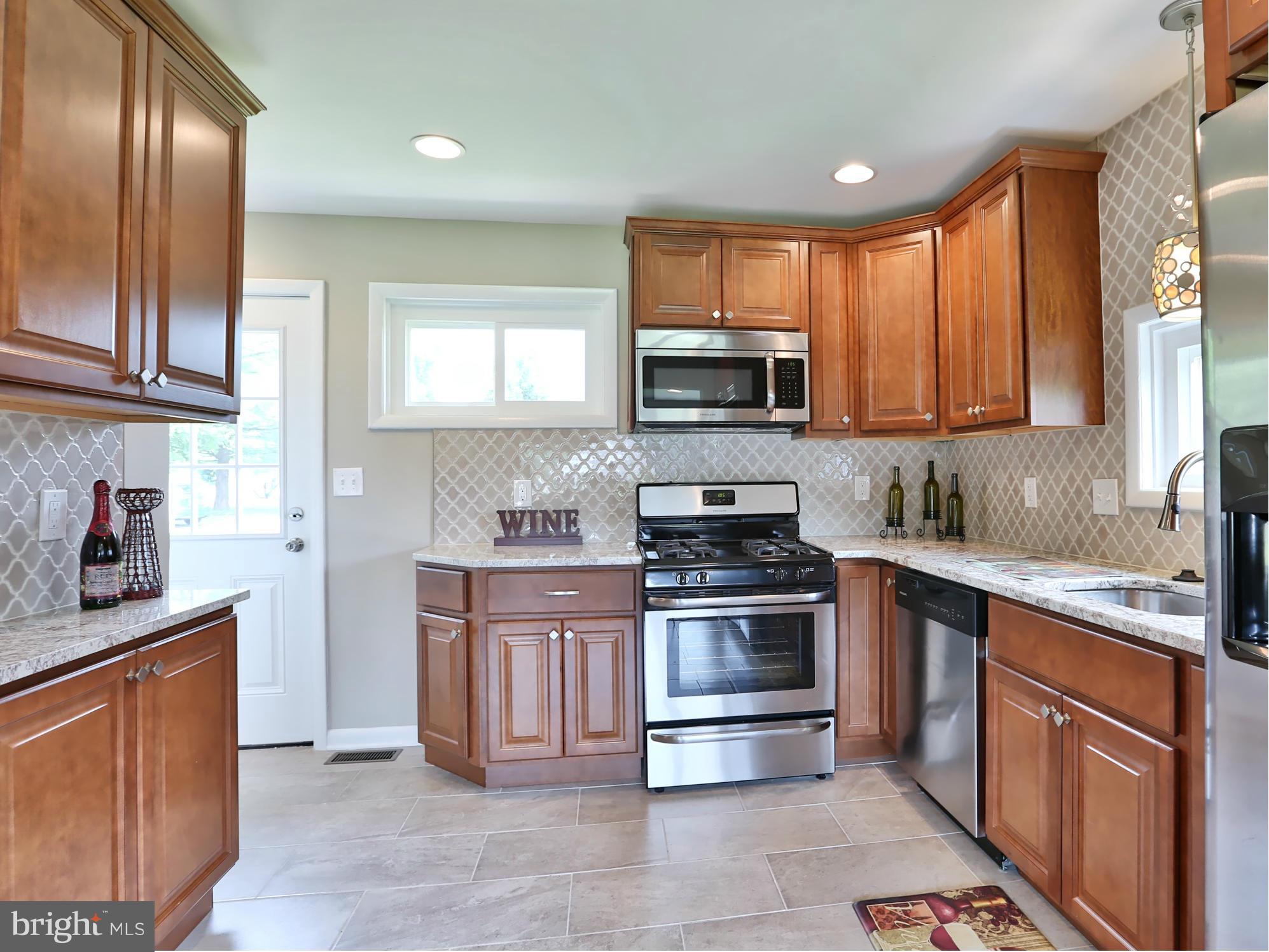 391 Butler Road Reisterstown, MD 21136 - Photo 6 of 30 Access To Rear Yard Makes Summer BBQs a Breeze!
