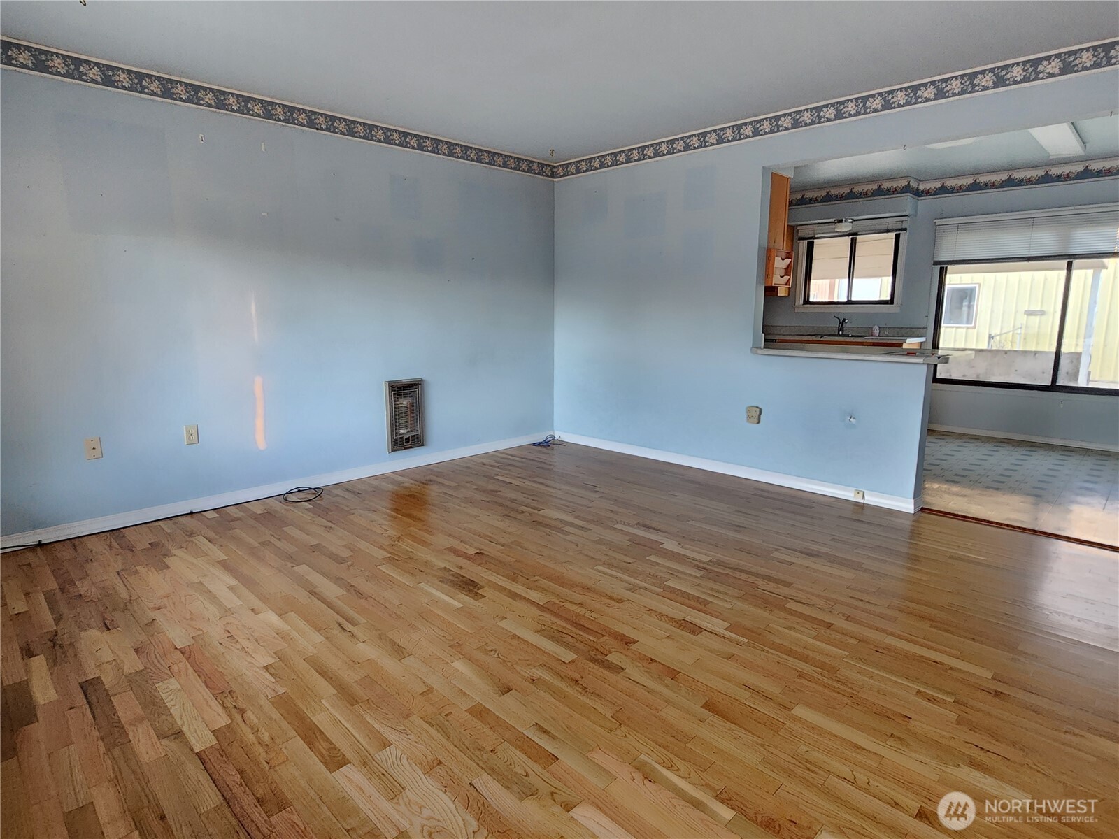 111 K Street Southwest Quincy, WA 98848 - Photo 2 of 19 a view of empty room with wooden floor and fan